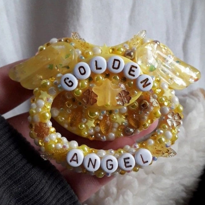 "Golden angel" paci