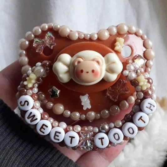 "Sweet tooth" paci